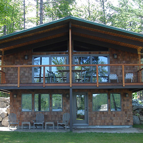 Wrap-around covered deck with a cable railing system