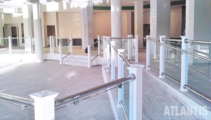 Create-a-statement-with-cable-railing using glass insets.