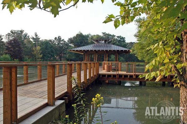 Seamless view with Atlantis Cable-Railing-on-a-Pond.