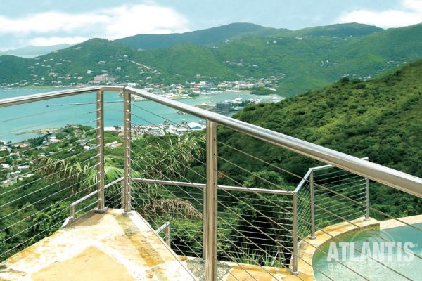 Cable railing on deck overlooking the Carribean.