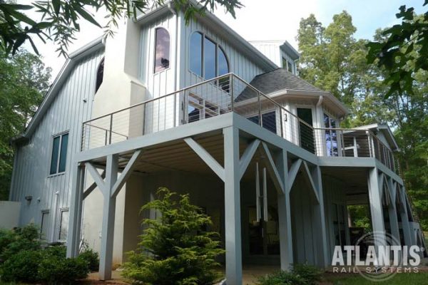 Home with stainless steel for cable railing on the 2nd story deck.