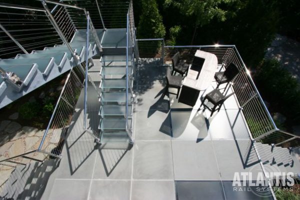 Outdoor install cable railing on stairs.